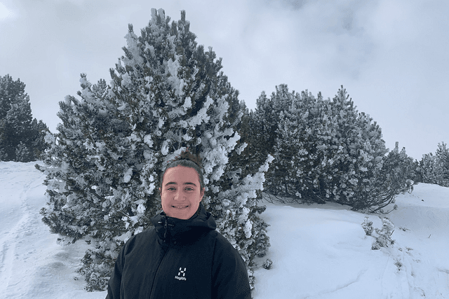 Martina Solano Soto smiling against a wintery background.